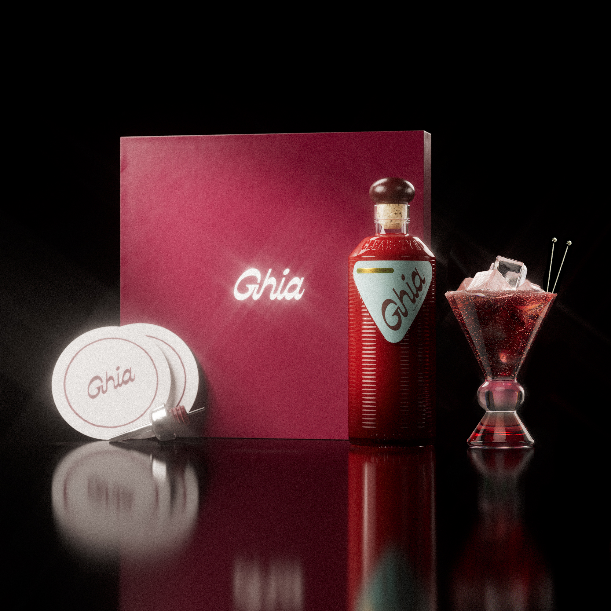 A Ghia non-alcoholic aperitif gift set with a burgundy box, paper coasters, 1 glass bottle of Original Apéritif, and a decorative cocktail glass that has a pink and amber base.