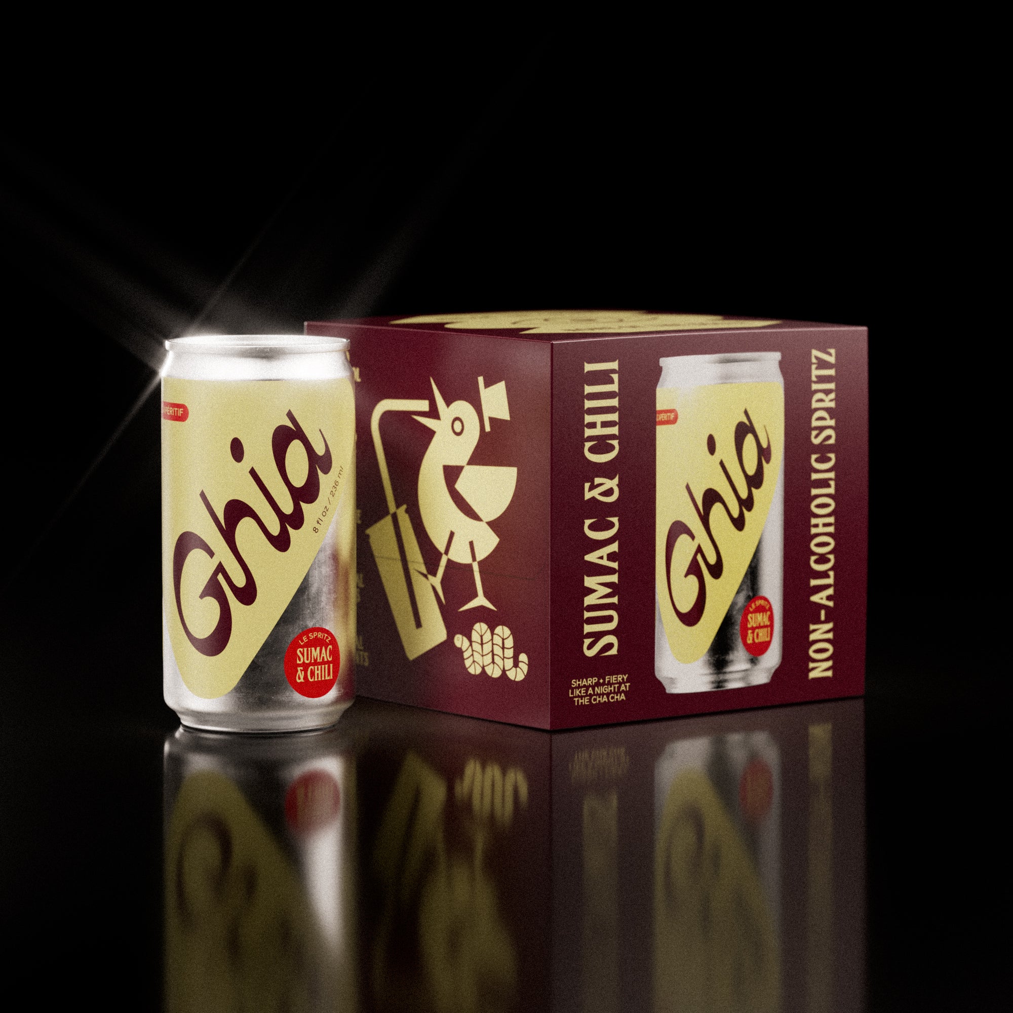 A pack of four Ghia Sumac & Chili non-alcoholic spritz cans with a maroon box featuring playful illustrations. One can is placed beside the box, reflecting on a surface.